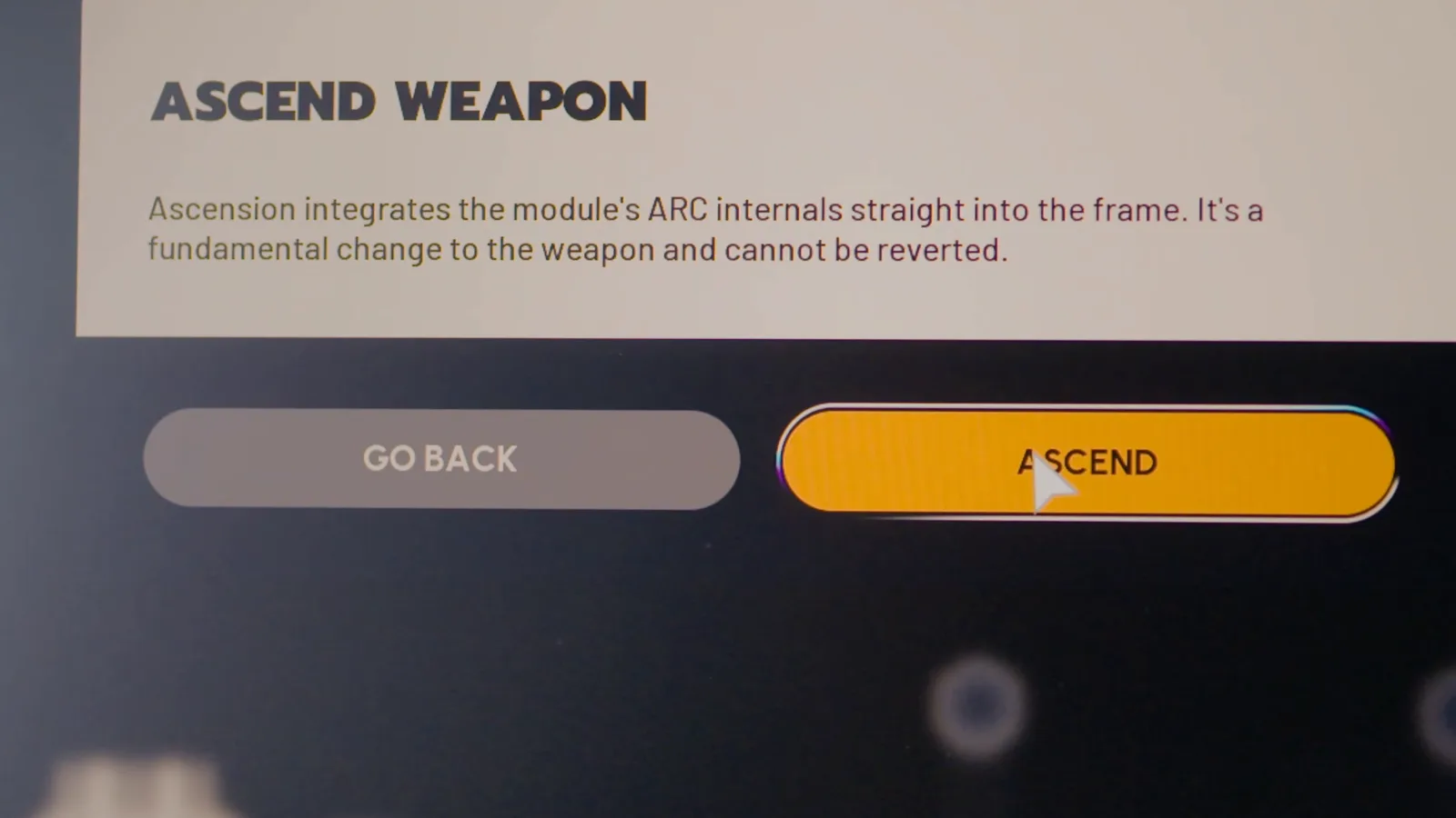 武器の増幅を確定する画面。戻るボタンと確定ボタンが並んでいる